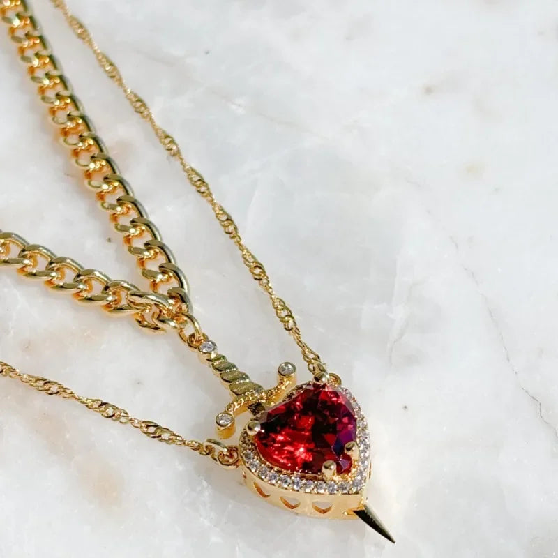 CONJUNTO PARA CASAL CORAÇÃO E ESPADA - PULSEIRA, COLAR E ANEL