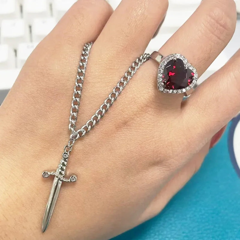 CONJUNTO PARA CASAL CORAÇÃO E ESPADA - PULSEIRA, COLAR E ANEL