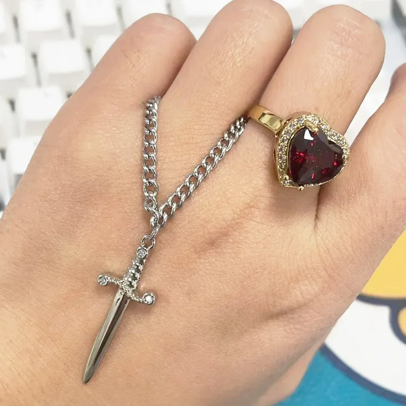 CONJUNTO PARA CASAL CORAÇÃO E ESPADA - PULSEIRA, COLAR E ANEL